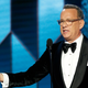 Illustration for article titled Witness the birth of the year's first meme with Tom Hanks' Golden Globes grimace